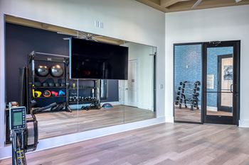 Yoga and spin studio with echelon mirrors